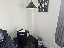 Snug - Meadhan Apartment