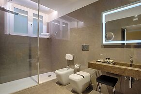 Caruso Place Boutique & Wellness Suites
