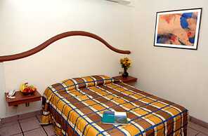 Del Real Hotel & Suites