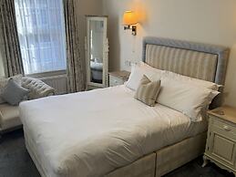 The Old Fourpenny Shop Hotel