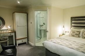 The Old Fourpenny Shop Hotel