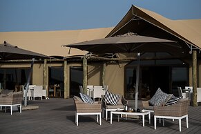 Kingfisher Retreat by Sharjah Collection