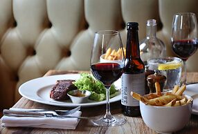The Porterhouse Grill & Rooms
