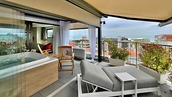 Monaco Suites Hotel