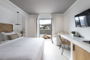 Adorno Beach Hotel & Suites