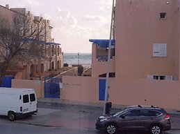 Beach House with Balcony and beach view