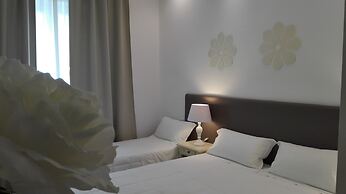 FLOS Guest House