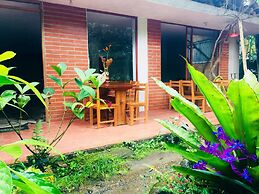 Cabañas Armonía y Jardín de Orquideas