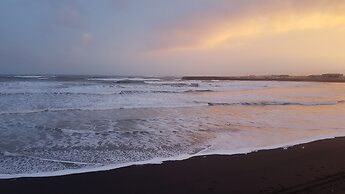 Black beach cottage