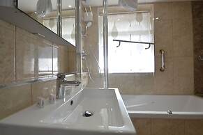 Hyde Park Suites - Apartments