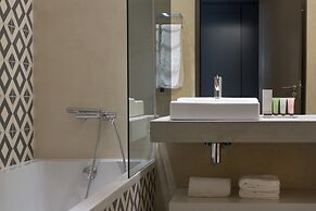 Ozadi Tavira Hotel