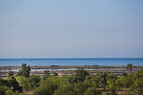 Ozadi Tavira Hotel