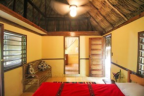 Cohune Palms River Cabanas