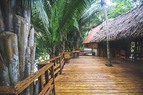 Cohune Palms River Cabanas