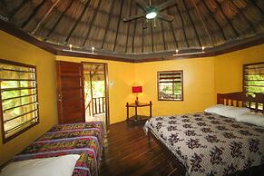 Cohune Palms River Cabanas