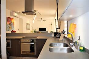High-end comfort 2BR Condo with pool access by Happy Address