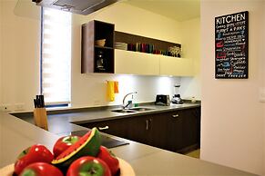 High-end comfort 2BR Condo with pool access by Happy Address