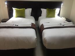 Cycad Palm Hotel