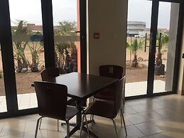 Cycad Palm Hotel