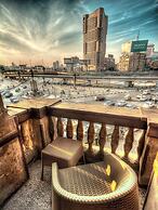 Tahrir Plaza Suites