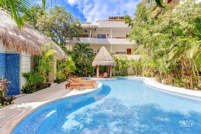Condo Complex with an Alluring Pool & Tropical Vibes by Stella Rentals