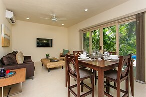 Condo Complex with an Alluring Pool & Tropical Vibes by Stella Rentals