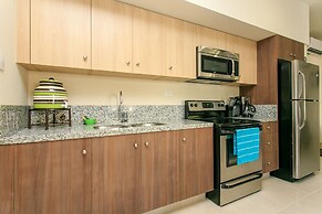 Condo Complex with an Alluring Pool & Tropical Vibes by Stella Rentals