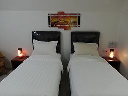 Madu Tiga Beach & Resort