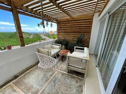Oceanfront New Condo on the Beach