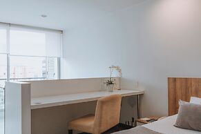 Travelers Orange Suites