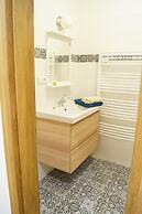 Apartmány u komína