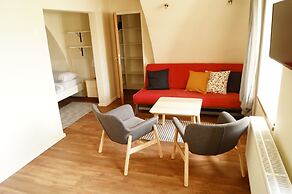 Apartmány u komína