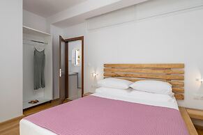 Milesian Suites
