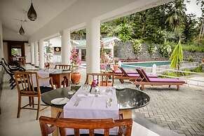 The Flame Tree Estate & Hotel