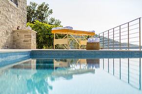 Beachfront Villa Poseidon with Heated Pool