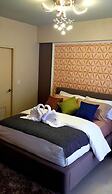 HnM Management - One Palm Tree Villas