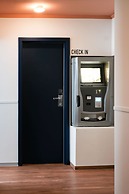 The Dot - 24-7 Check-in