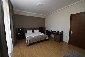 Olympus Hotel By Umbrella