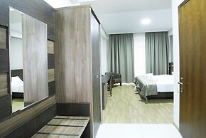 Olympus Hotel By Umbrella