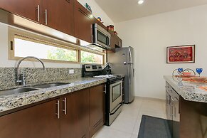 Condos Perfectly Situated Between the Beach & Tulum Town by Stella Ren