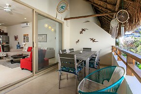 Condos Perfectly Situated Between the Beach & Tulum Town by Stella Ren