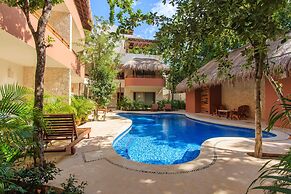 Condos Perfectly Situated Between the Beach & Tulum Town by Stella Ren