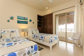 Condos Perfectly Situated Between the Beach & Tulum Town by Stella Ren