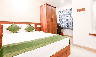 Treebo Comforts Inn, University Road Deralakatte