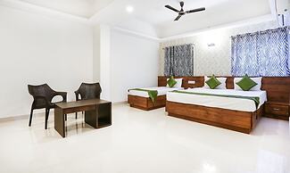 Treebo Comforts Inn, University Road Deralakatte
