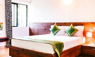 Treebo Comforts Inn, University Road Deralakatte