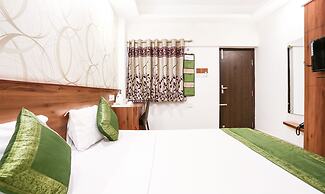 Treebo Comforts Inn, University Road Deralakatte