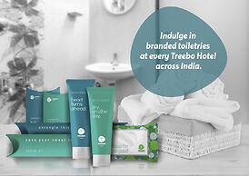 Treebo Comforts Inn, University Road Deralakatte