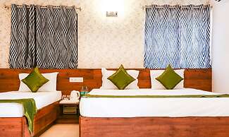 Treebo Comforts Inn, University Road Deralakatte