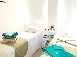 Apartasuites La Flora